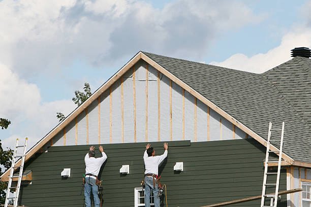 Professional Storm Damage Siding Repair technician working in Plainfield, IN